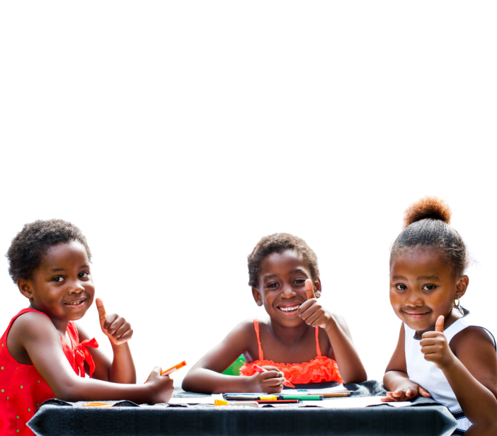 children doing leisure activity and thumbs up at table